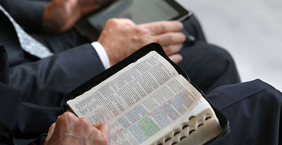 reading bible in church