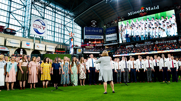 Elder Bednar throws first pitch to mission president, former MLB