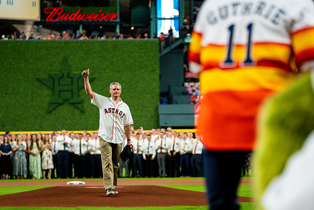 Elder Bednar throws first pitch to mission president, former MLB