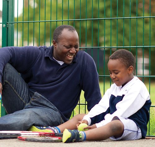 father and son at park