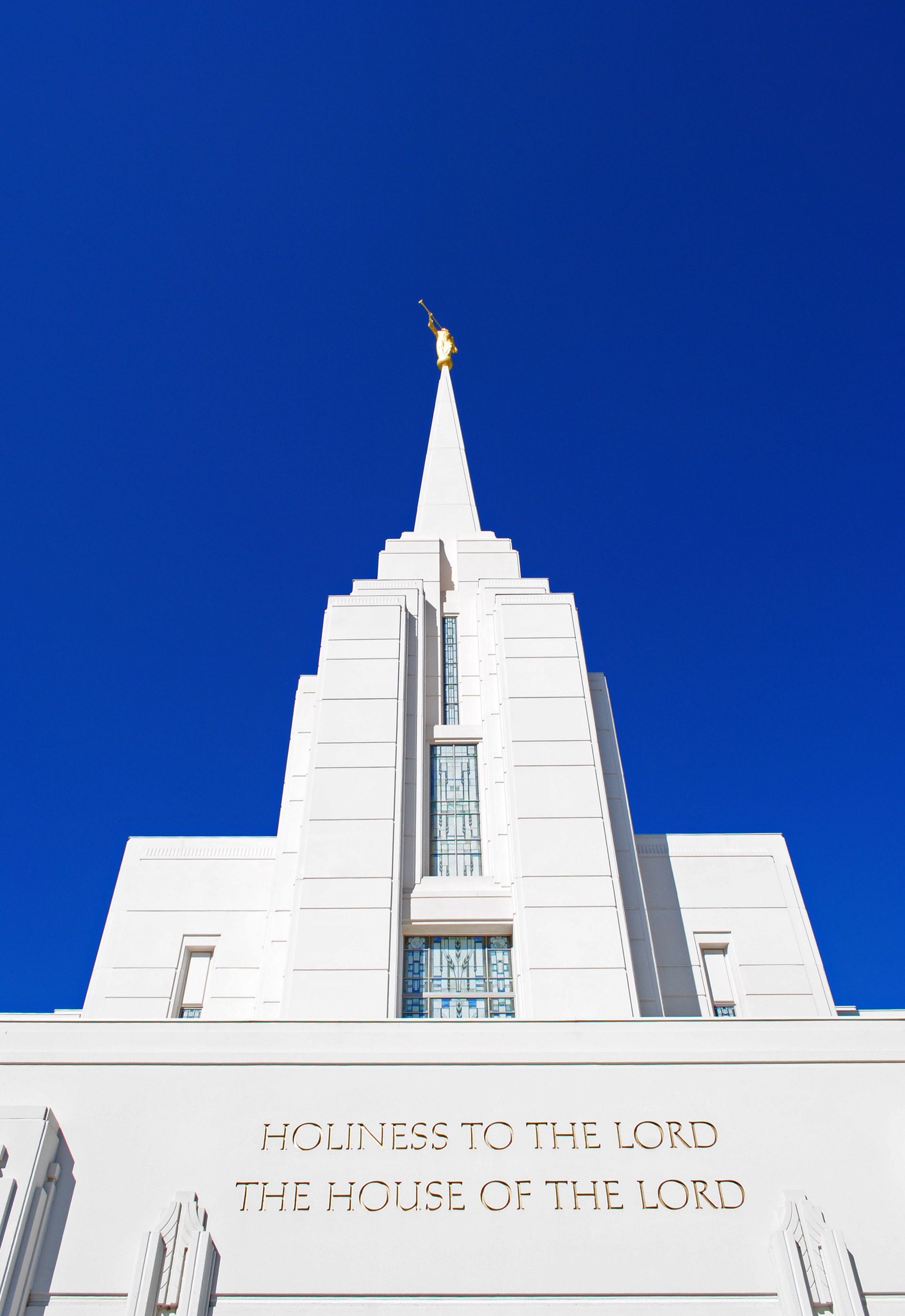 The Rexburg Idaho Temple inscription, “Holiness to the Lord: The House of the Lord,” including the spire.