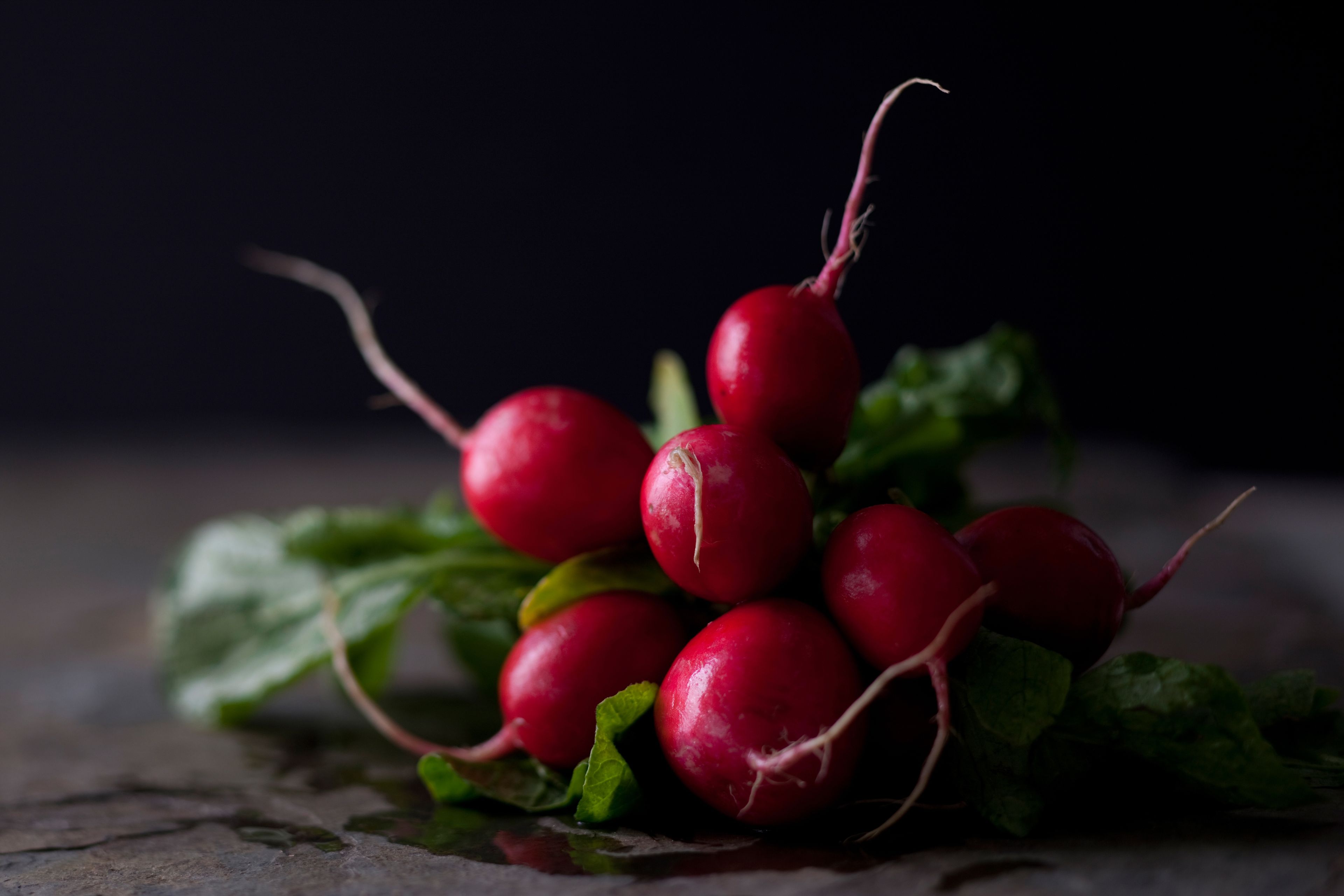 Red radishes on a table.