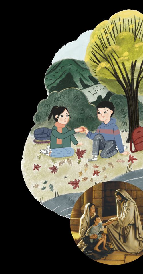 Girl and boy having lunch under a tree