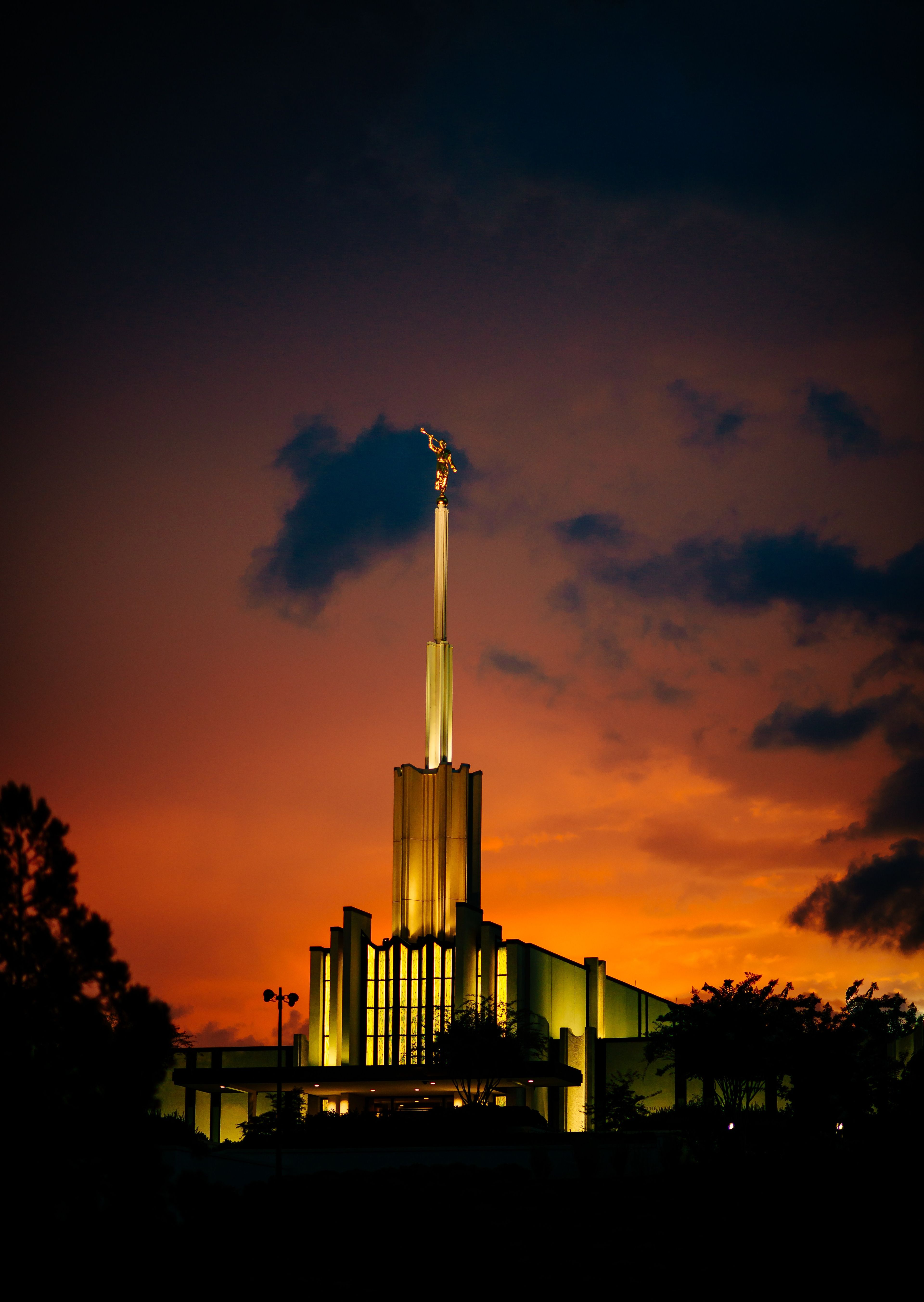 The Atlanta Georgia Temple is lit up at night.