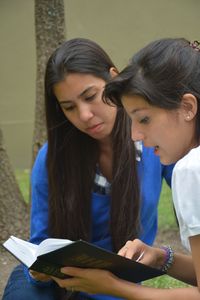 youth sharing the gospel with friend