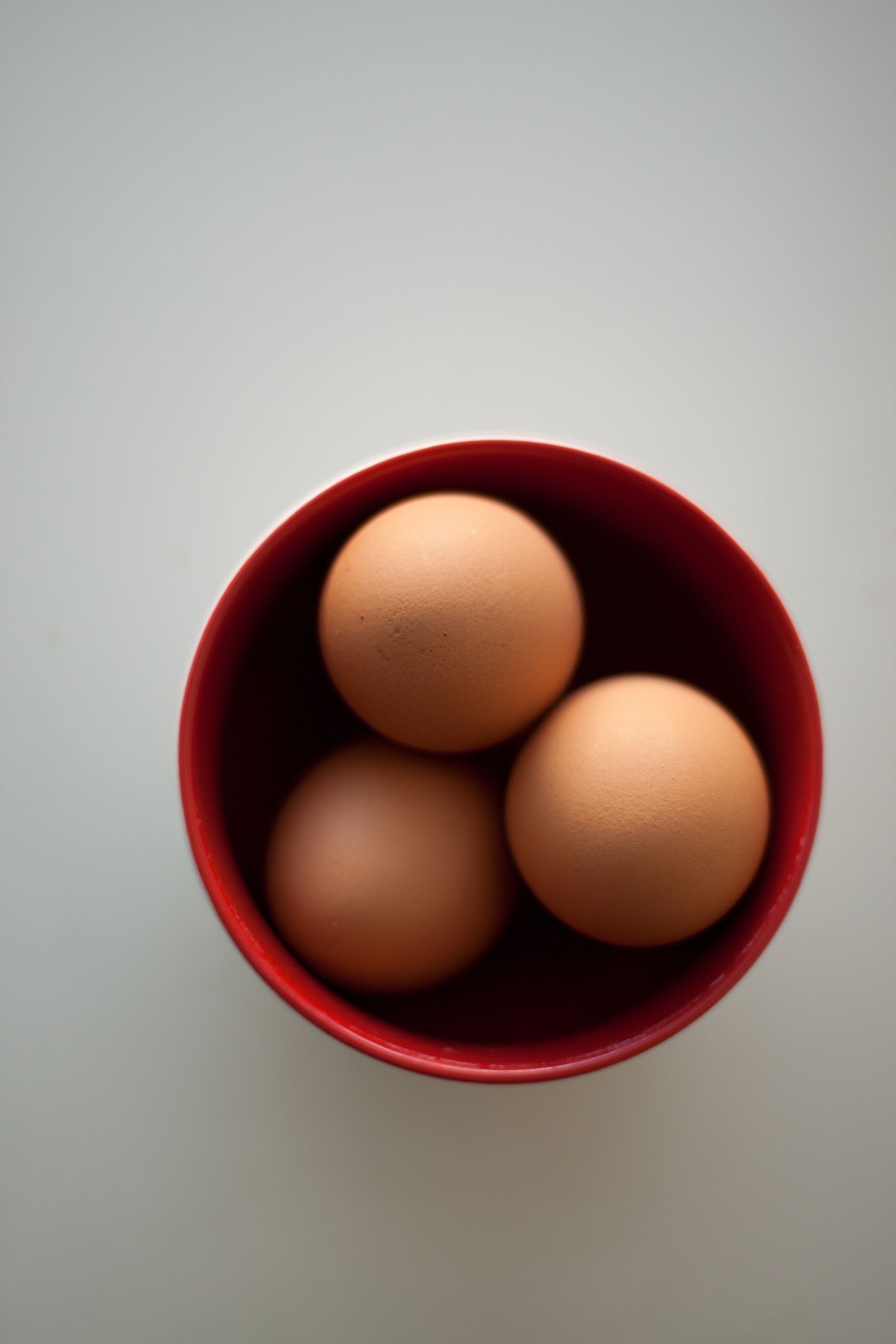 Tan eggs in a bowl.