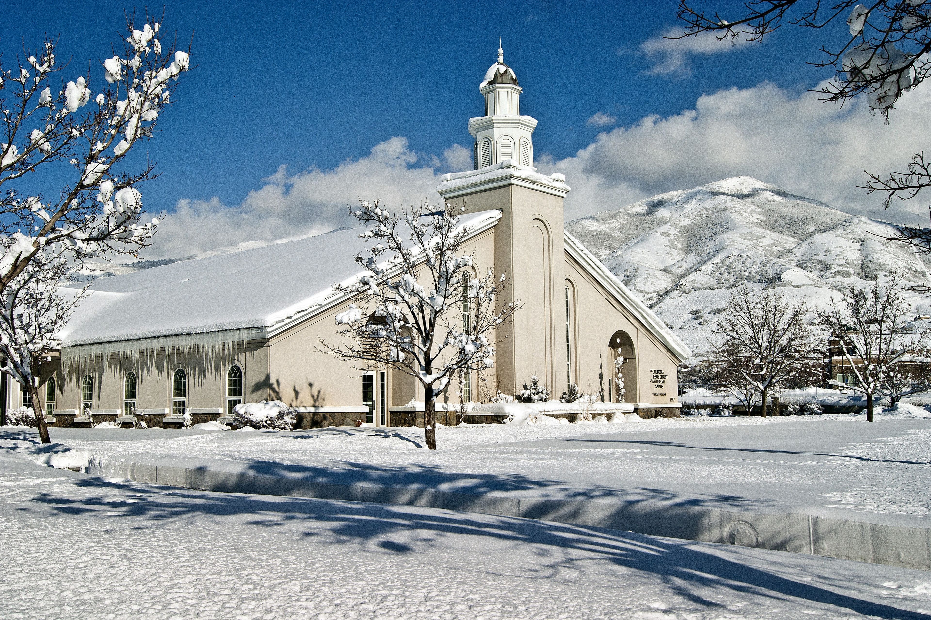 A snow-covered chapel and ground in Farmington, Utah.