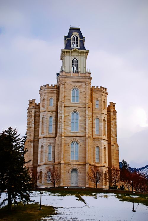 A side view of an entrance into the Manti Utah Temple in the wintertime.