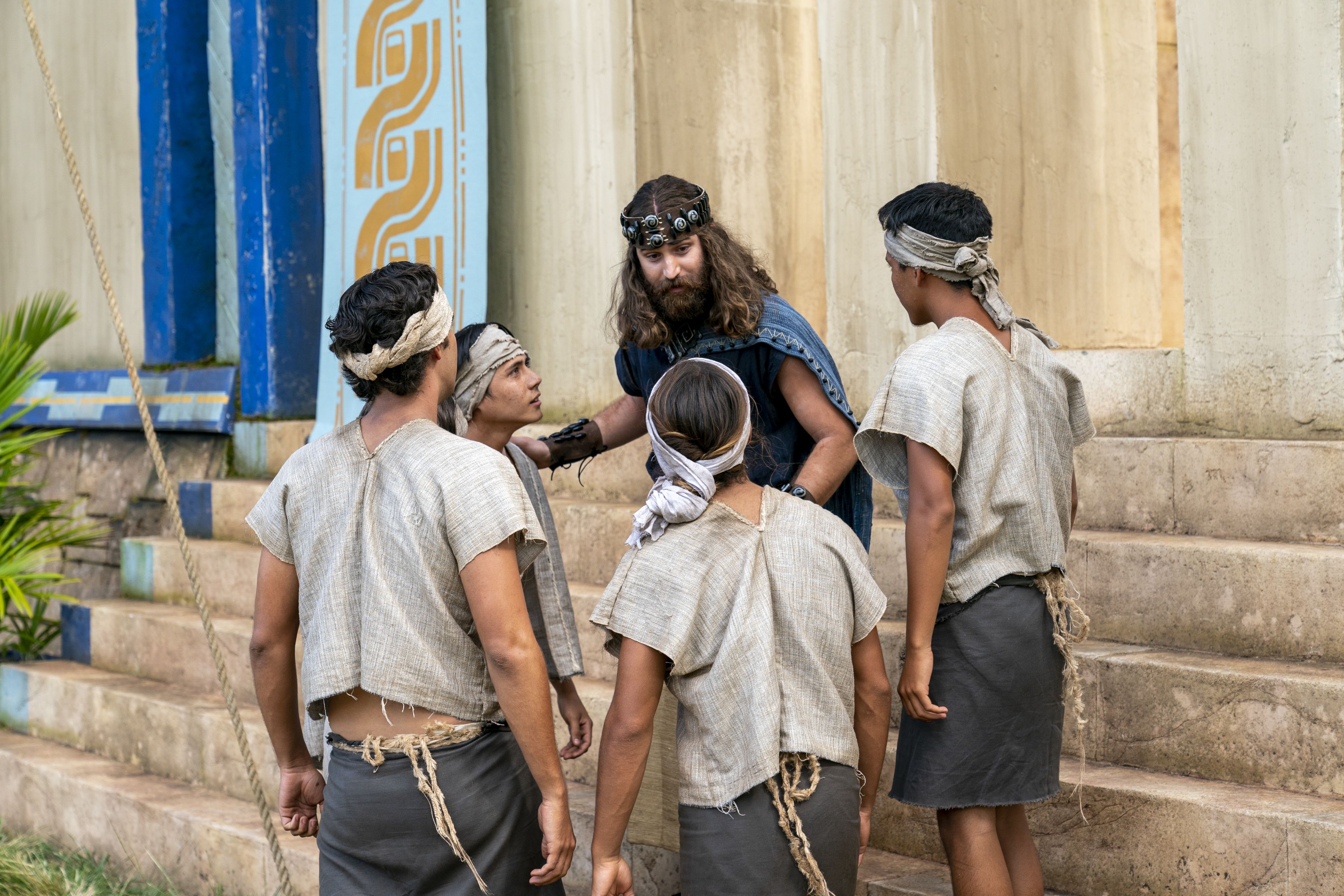 Mosiah talks to young men outside of the temple in the Land of Zarahemla.