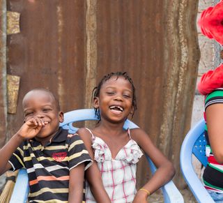 The faces of many children in DR Congo.