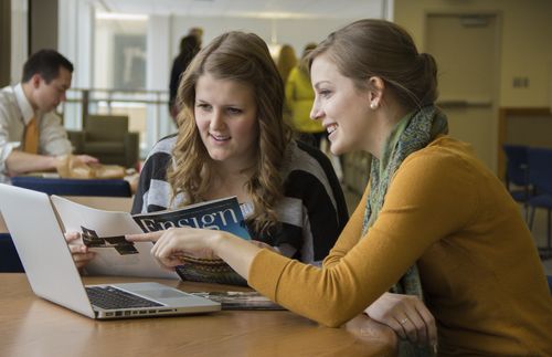 young adult women reading