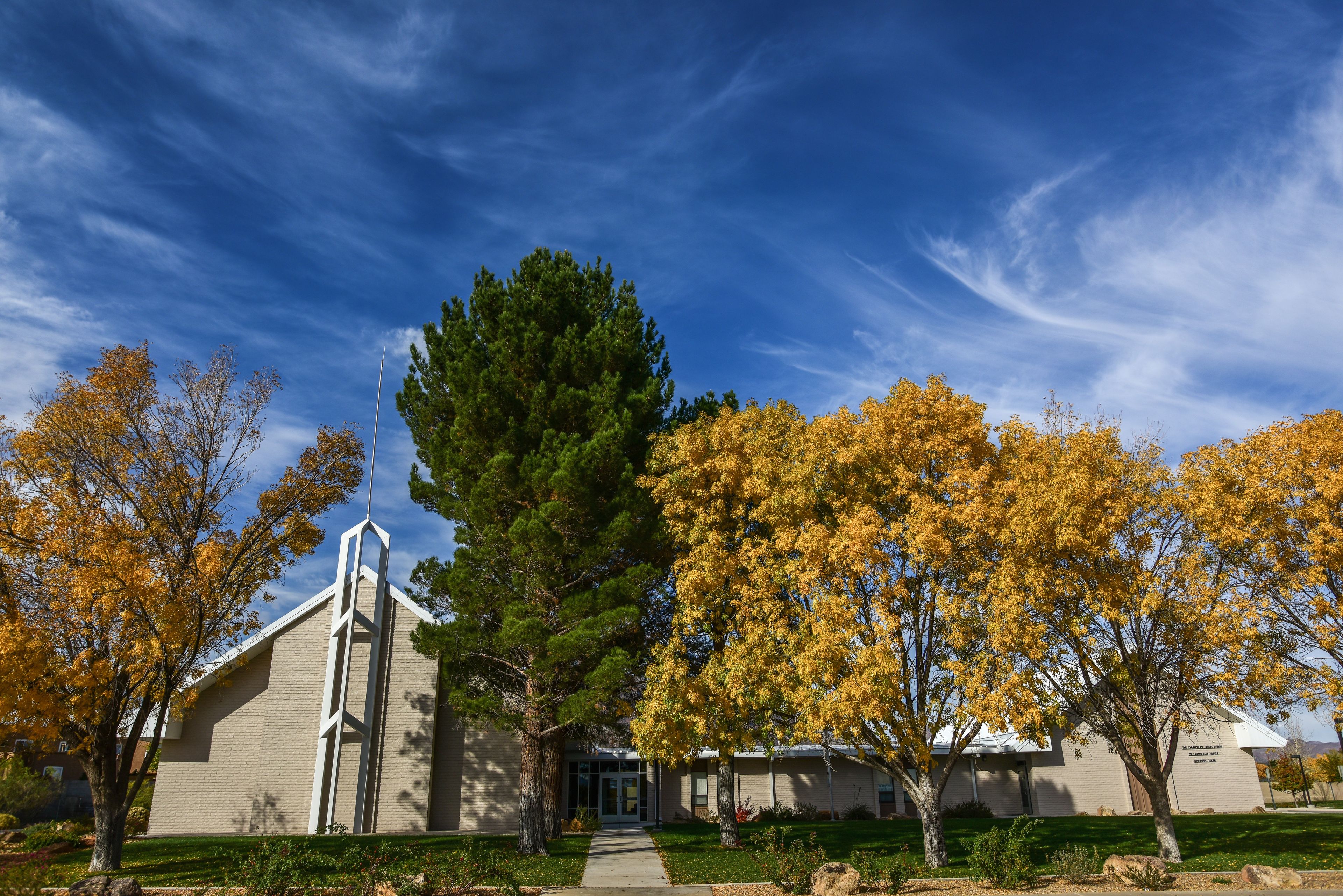 A chapel hidden behind trees in Socorro, New Mexico.