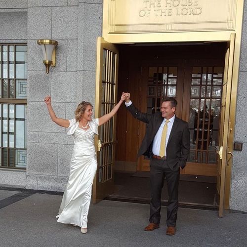 a newly married couple exiting the temple