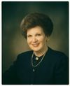 Frontal head and shoulders official portrait of Relief Society general president Mary Ellen Wood Smoot.