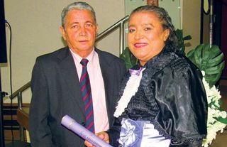 husband and his wife on her graduation day