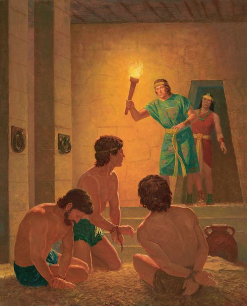 A painting by Gary L. Kapp illustrating Ammon standing and carrying a torch while finding his brother Aaron and his companions on the prison ground.