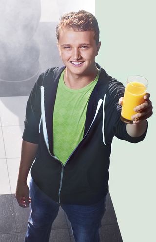 young man with orange juice