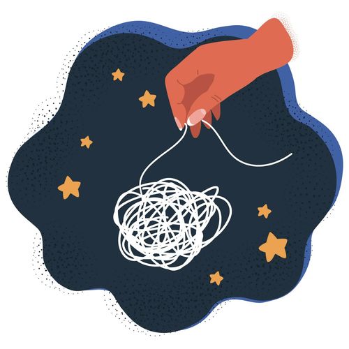 a hand untangling a ball of yarn