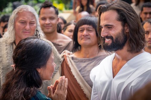 Jesus Christ teaches that He will return to the Father, but then invites all to come to be healed. He stands near a deaf woman in the City of Bountiful outside the temple.