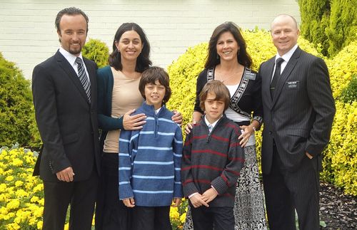 family with missionary couple