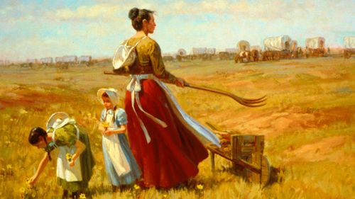 woman and children working in the field