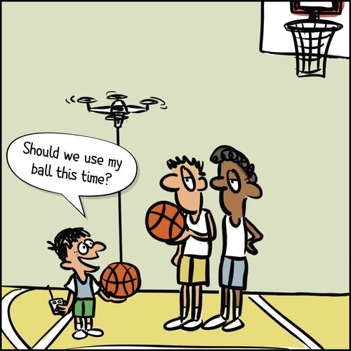 boys playing basketball, one holding a ball tethered to a drone