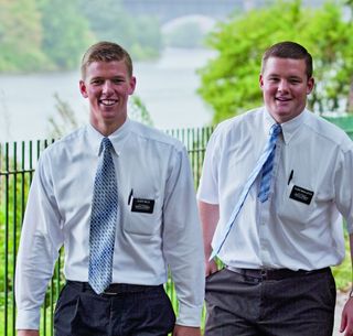 Elder missionaries walking in England.