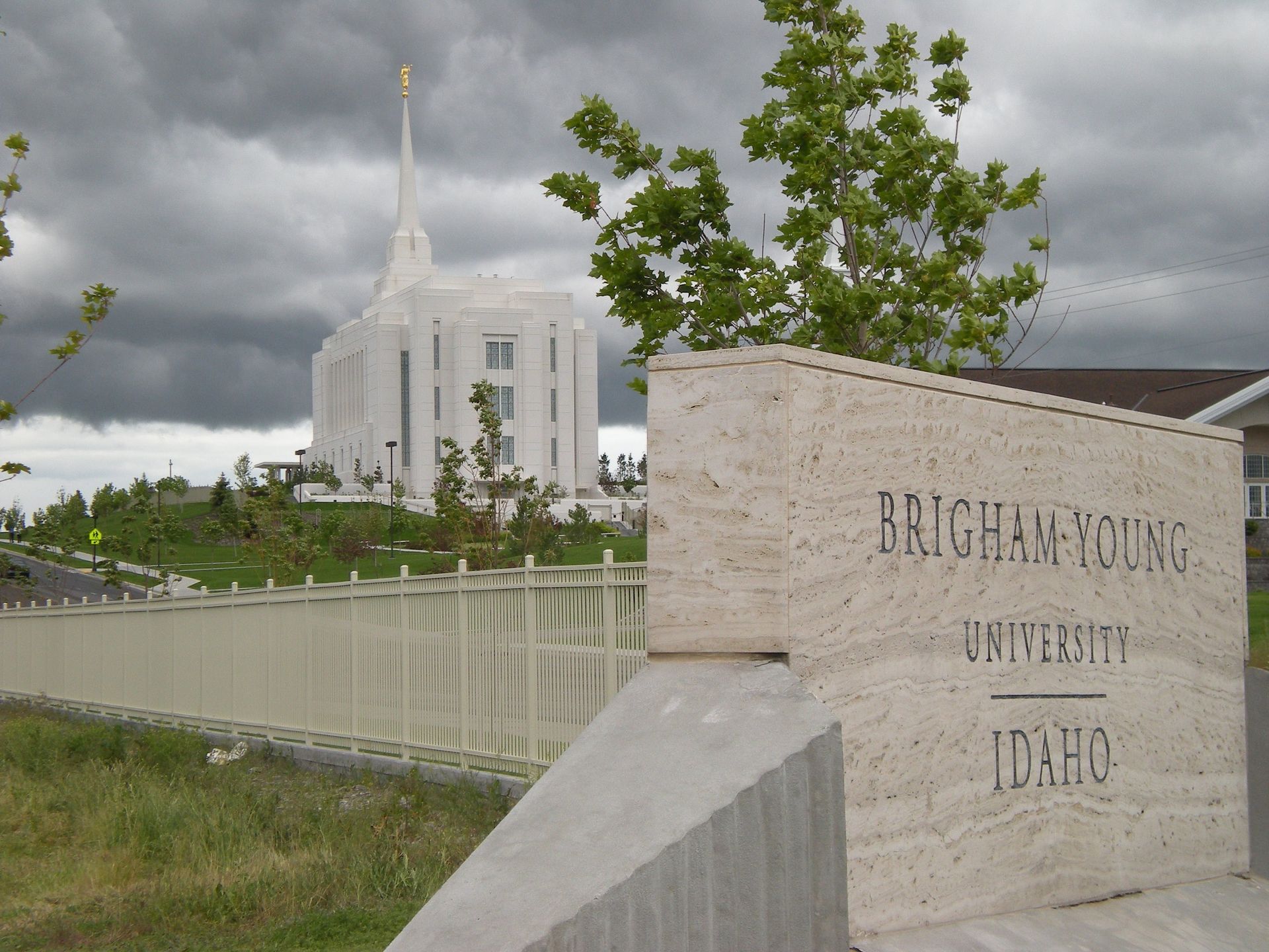 The entire Rexburg Idaho Temple, including the school, name sign, and scenery.