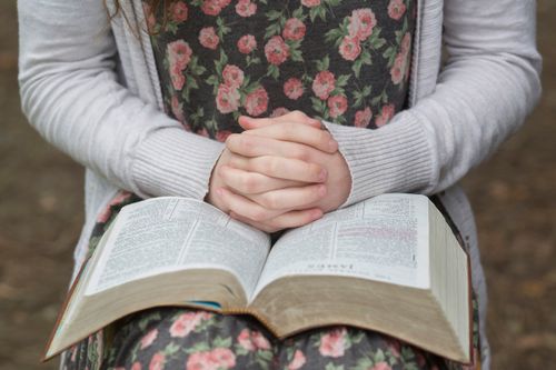 woman reading scriptures