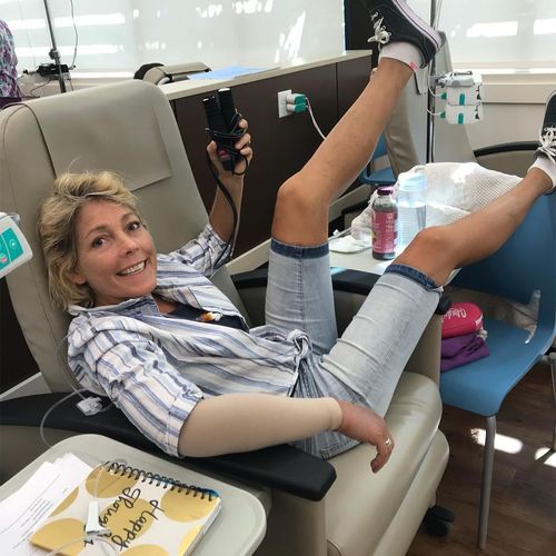 woman sitting in a hospital chair