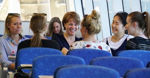 Sharon Eubank visiting with women