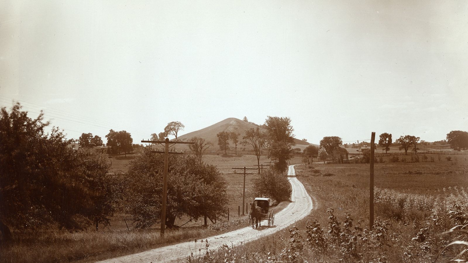 Hill Cumorah. Road from Palmyra to Manchester looking south.