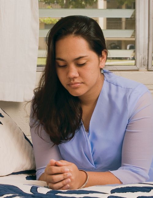 young woman praying