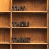 block letters on wood shelves