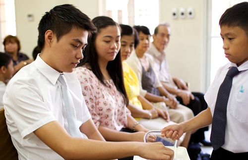 Filipino church members during a sacrament meeting.