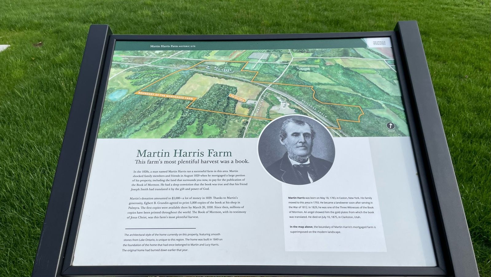 An informational marker about the Martin Harris Farm. 