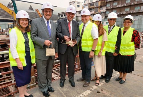 Elder Andersen and others visiting the temple site