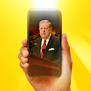 Hand holding cell phone with image of Elder Holland.