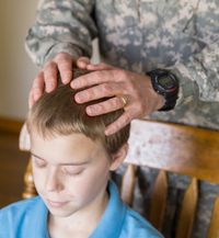 boy receiving blessing