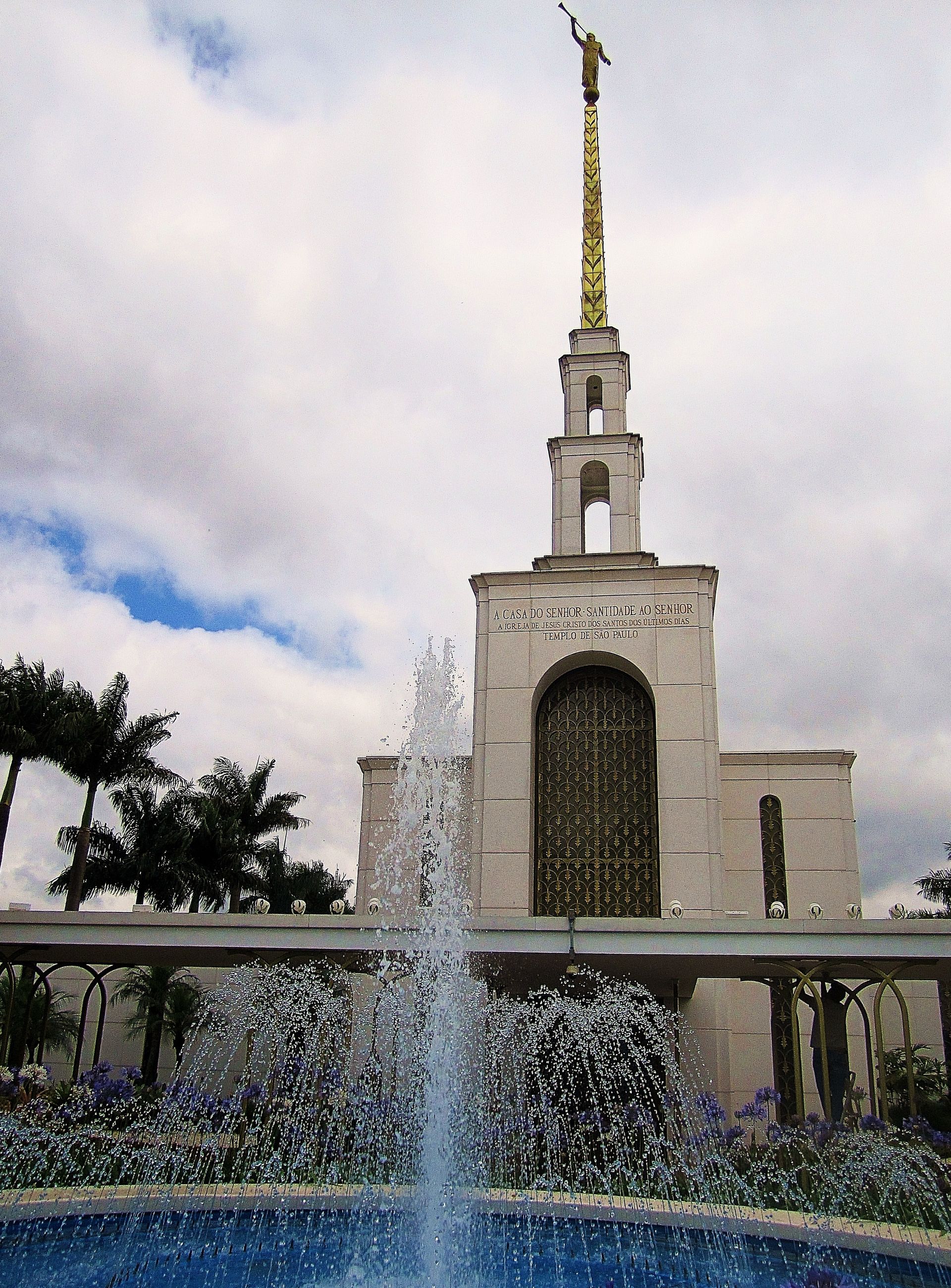 The São Paulo Brazil Temple fountain, including the spire and entrance.