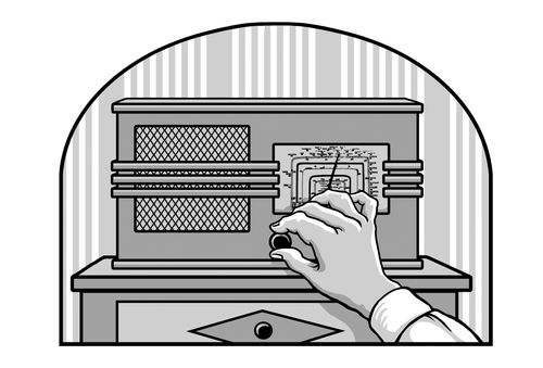 hand turning dial on 1940s-era radio