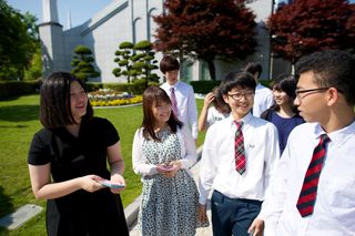 group of youth outside the temple