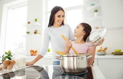 mother and daughter in kitchen