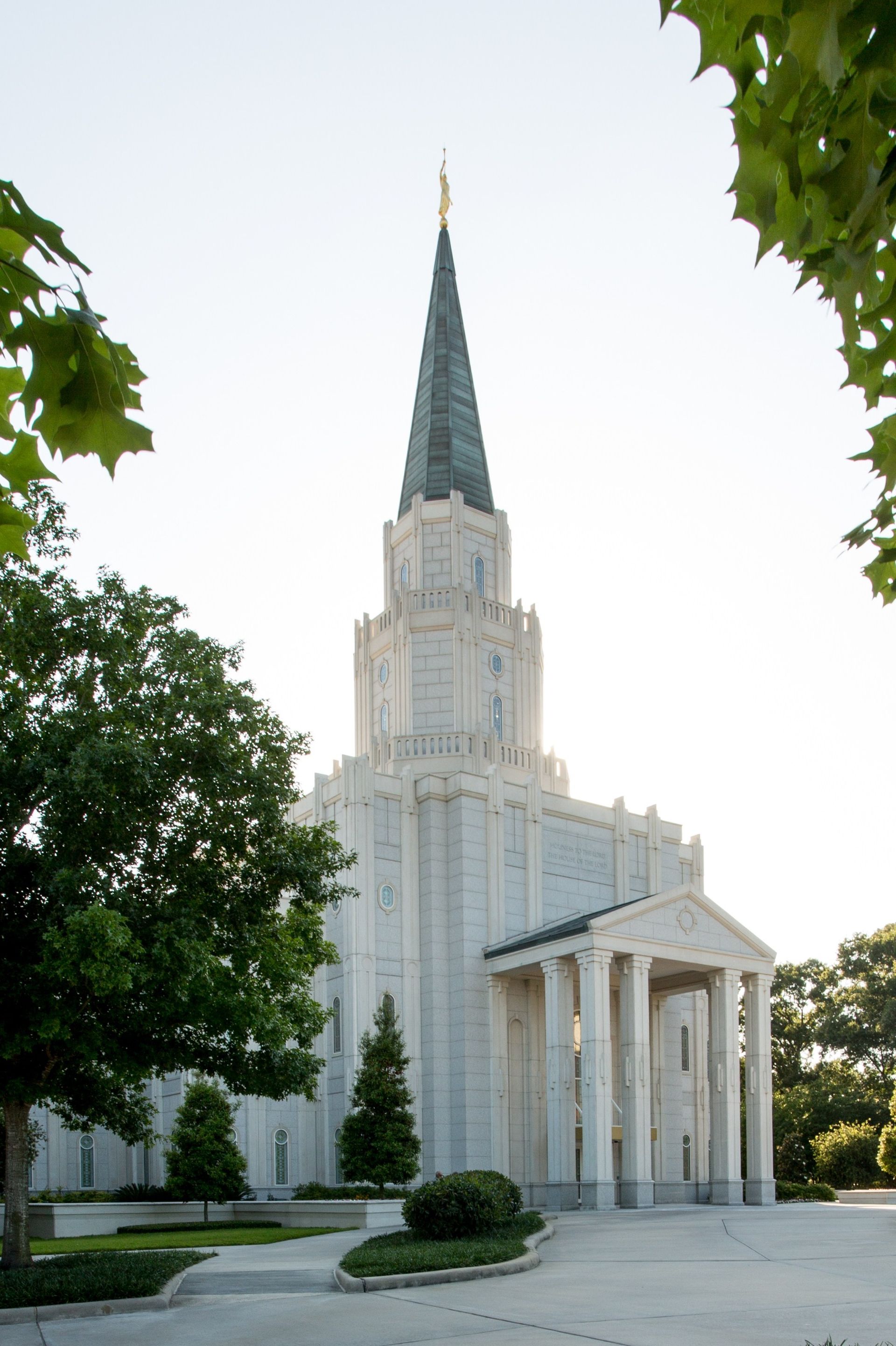 A portrait view to the entrance of the Houston Texas Temple.
