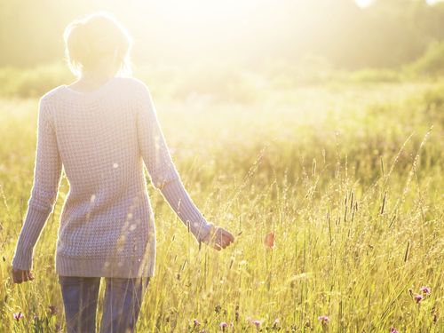 woman standing in field