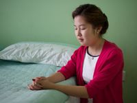 young woman praying