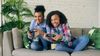 Sisters playing video games