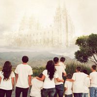 A family standing together on a dirt road looking at the Salt Lake Temple which has been superimposed on the sky. Eternal Destination