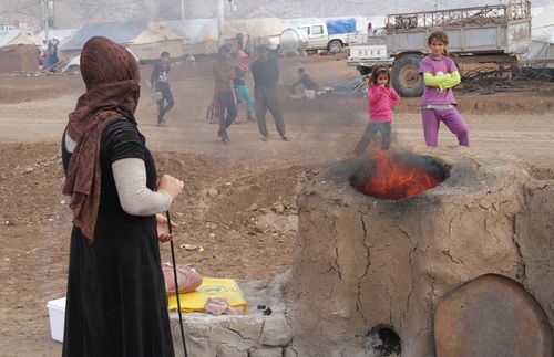 Woman in a refugee camp