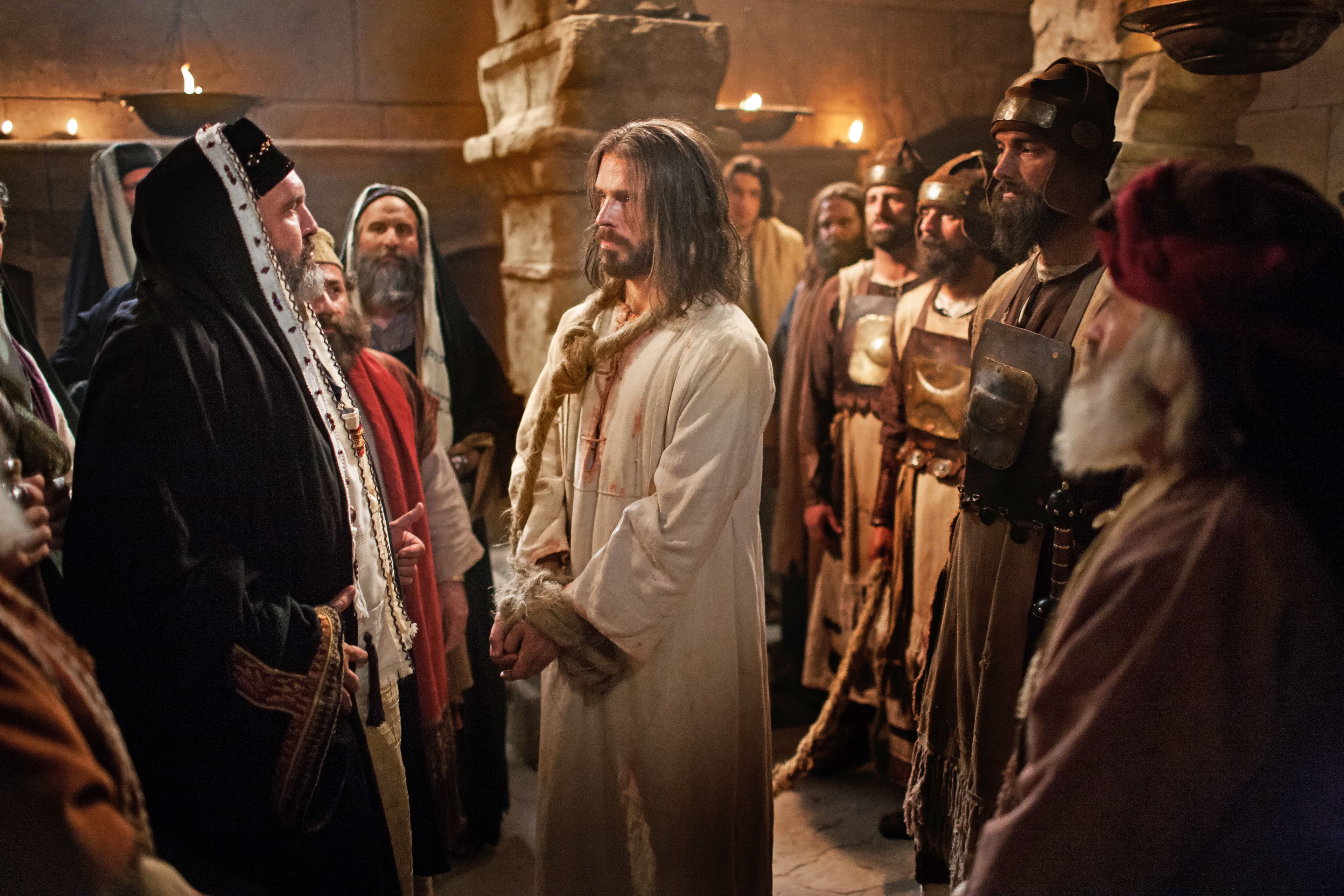 Jesus standing bound before Caiaphas and the Sanhedrin.